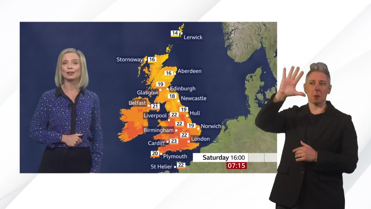 A woman in a patterned blouse stands beside a map of the United Kingdom, while a person on the right uses hand gestures. The BBC News weather report shows projected temperatures across the country.
