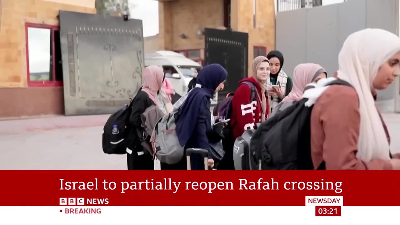 A group of young women, all wearing hijabs, walk with their luggage. They appear to be heading towards a large gate, with a white van visible behind them.