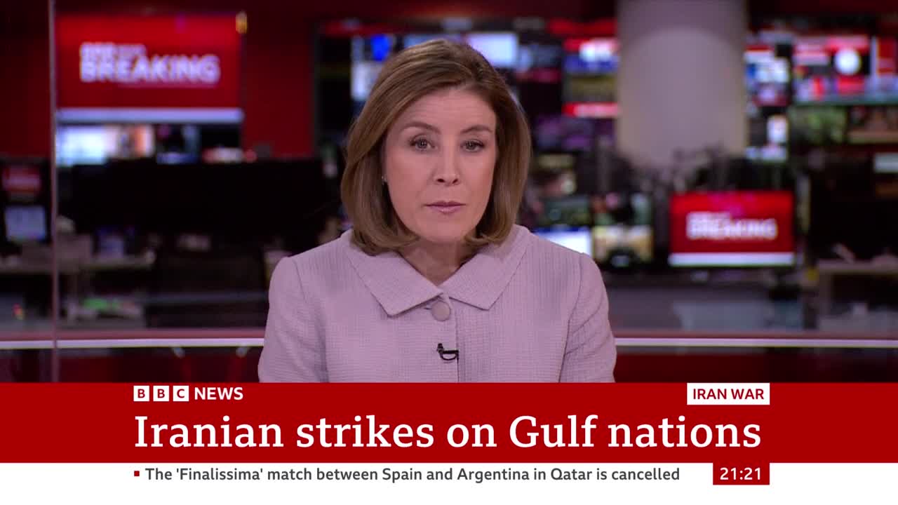 A BBC News anchor reports on Iranian strikes on Gulf nations. Behind her, screens display "BREAKING" news.