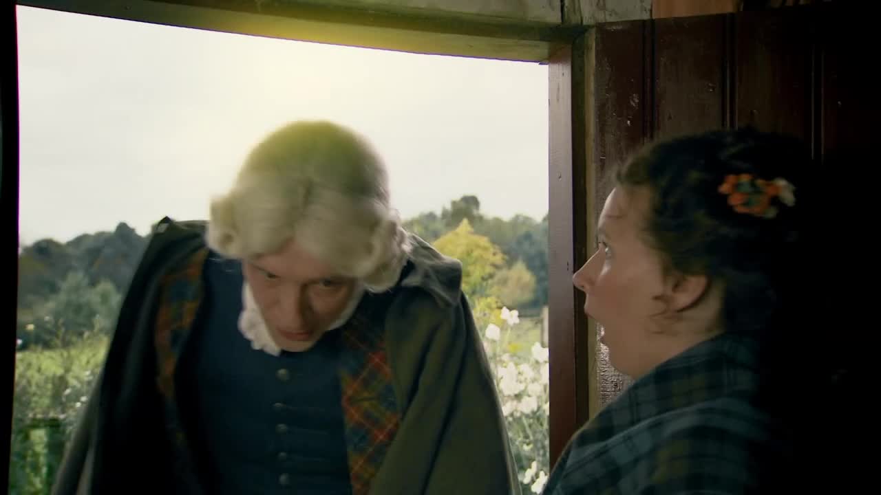 A person in a powdered wig leans into the room, their plaid cape billowing slightly. Beside them, another woman looks on, her expression a mix of surprise and concern.
