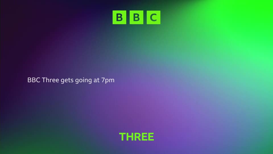 The BBC logo, three green squares, flashes at the top.  Text announces "BBC Three gets going at 7pm" against a purple and green gradient.