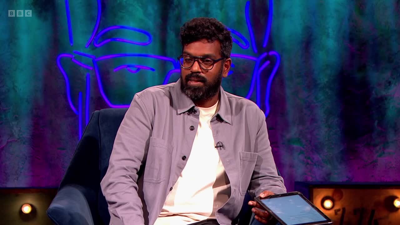 The man in glasses sits in a chair, holding a tablet. He looks down at it, seemingly focused on what's on the screen.
The man in glasses sits in a chair, holding a tablet. He looks down at it, seemingly focused on what's on the screen.