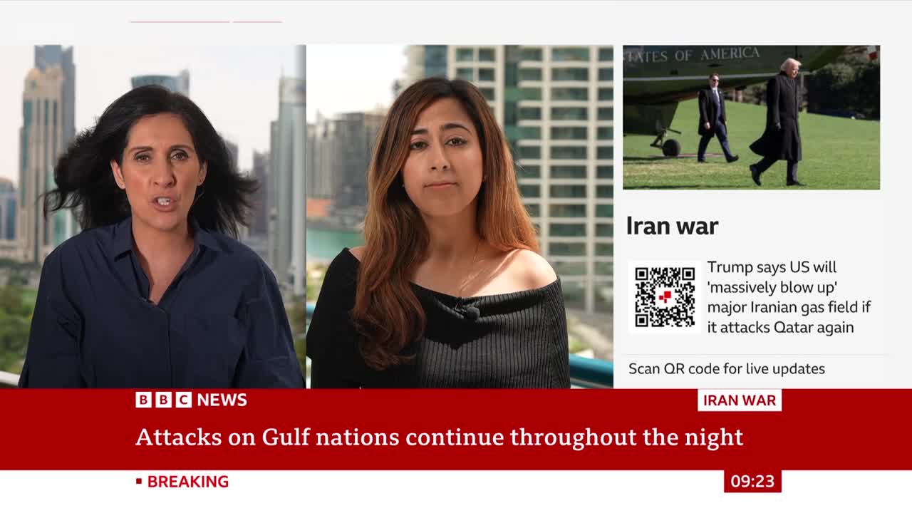 Two women are speaking, with a cityscape behind them. A news ticker at the bottom of the screen announces "Attacks on Gulf nations continue throughout the night."