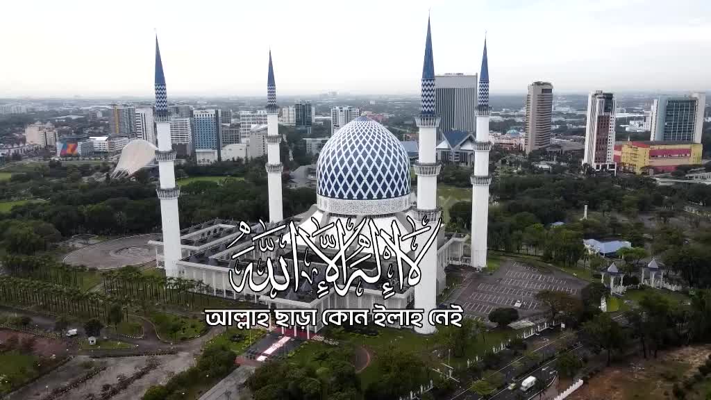A large mosque with tall minarets and a blue-tiled dome dominates the scene, set against a city skyline. The image, likely from a broadcast like Deen TV in the United Kingdom, features Arabic script prominently displayed over the mosque.
