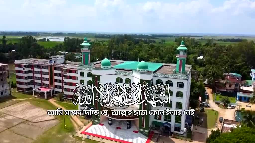A large building with green domes and minarets dominates the landscape, with Arabic script overlaid on the facade. The scene appears to be a broadcast, possibly from Deen TV, with text in a local language at the bottom.
