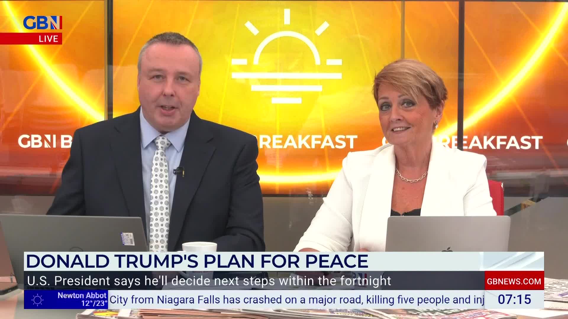 Two presenters, a man and a woman, sit behind desks, speaking to the camera on GB News' "Breakfast" show. The headline "DONALD TRUMP'S PLAN FOR PEACE" is displayed on the screen below them.
