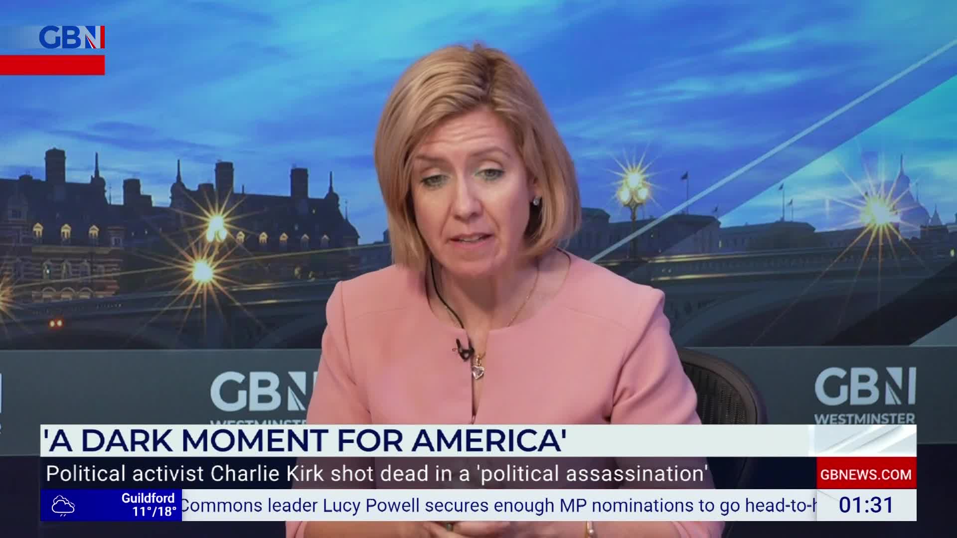 A woman in a pink blazer is speaking, her gaze directed forward on a GB News set. The lower third of the screen displays a headline about an American political event.
