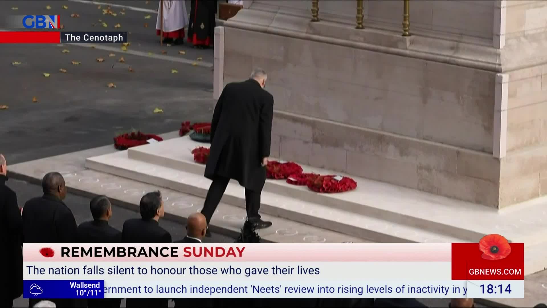 A man in a long, dark coat walks toward the Cenotaph, wreaths of red poppies already laid out on the steps. GB News is broadcasting live from Remembrance Sunday in the United Kingdom.
A man in a long, dark coat walks toward the Cenotaph, wreaths of red poppies already laid out on the steps. GB News is broadcasting live from Remembrance Sunday in the United Kingdom.