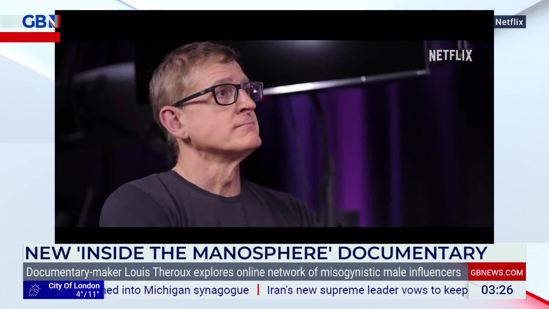 A man with glasses looks off to the side, his expression thoughtful. A GB News chyron announces a new documentary.