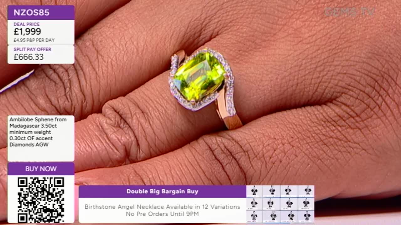 A hand, likely in the United Kingdom, presents a large ring with a vibrant green gemstone on Gems TV. The ring's details, including the price, are displayed alongside a "Buy Now" QR code.
