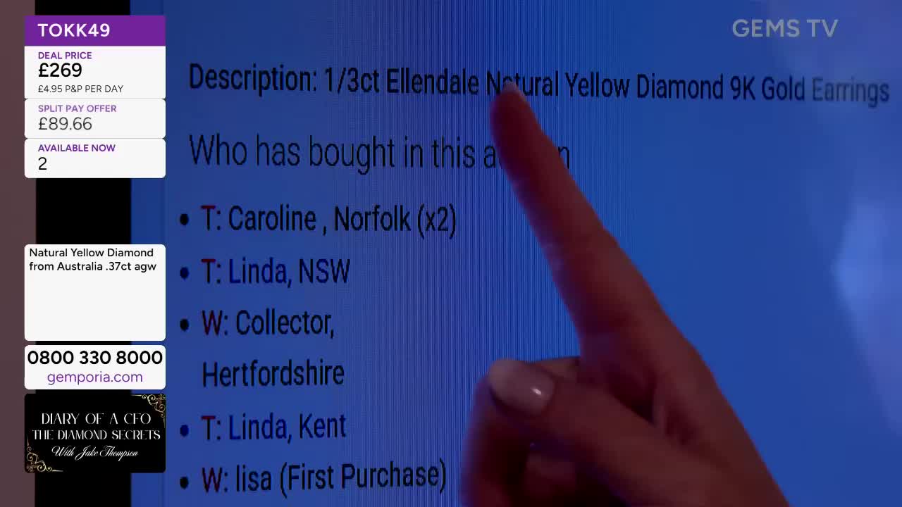 A finger points at the description of the earrings on Gems TV, highlighting the item's details. The screen displays a list of buyers, including Caroline from Norfolk.
