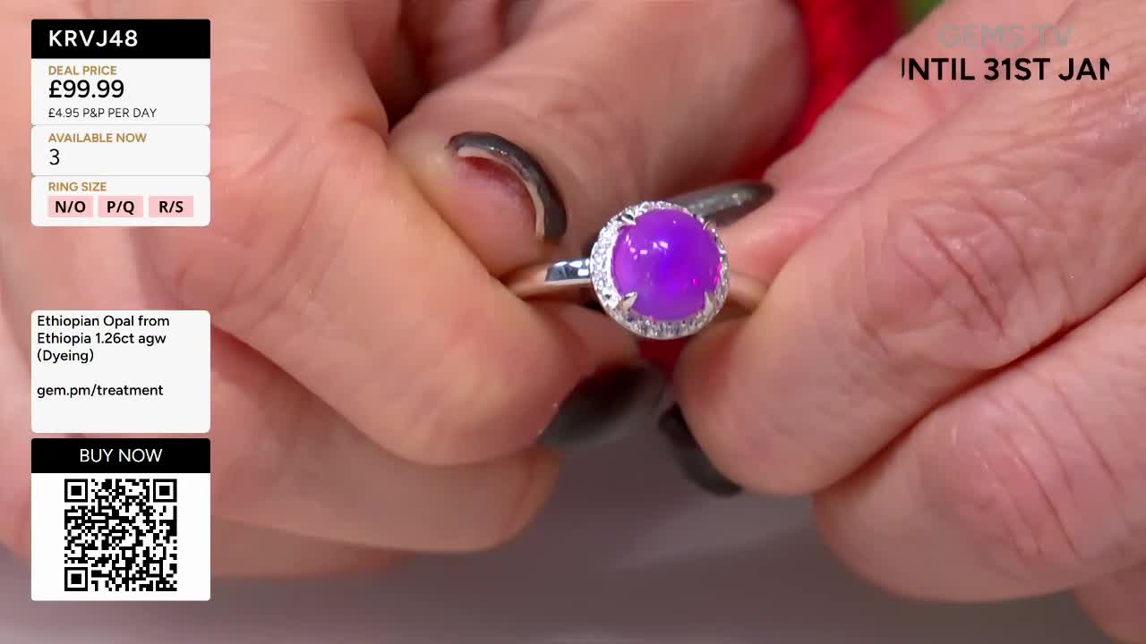 A hand holds a silver ring with a large, vibrant purple stone, showing it off to the camera. The Gems TV price and details are displayed in the corner, and the sale ends at the end of the month.
