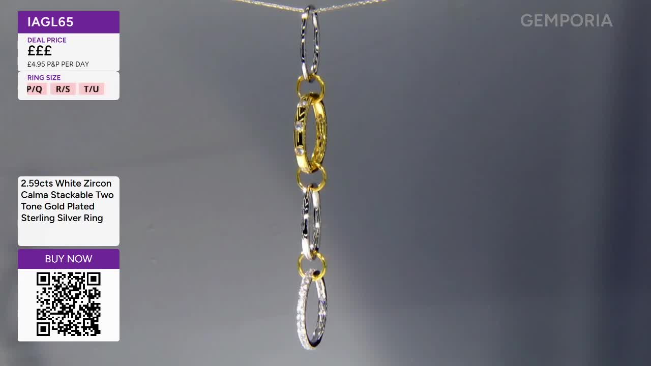 A delicate chain of interlocking oval links, some gold-plated and others sterling silver, hangs suspended. The links shimmer, catching the light as they gently sway.