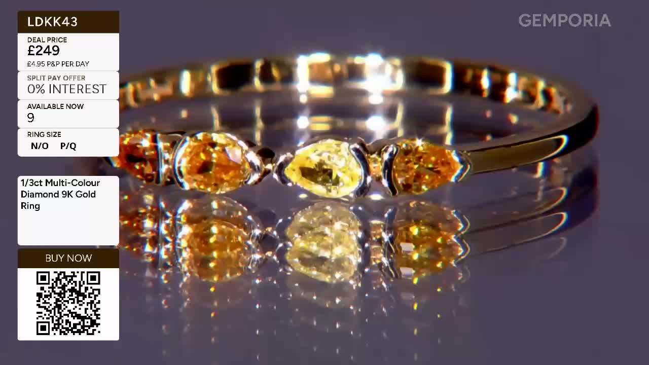 The ring, featuring a line of warm, multi-coloured diamonds, slowly rotates on a reflective surface. Its gold band catches the light, creating a dazzling display. The ring, featuring a line of warm, multi-coloured diamonds, slowly rotates on a reflective surface. Its gold band catches the light, creating a dazzling display.