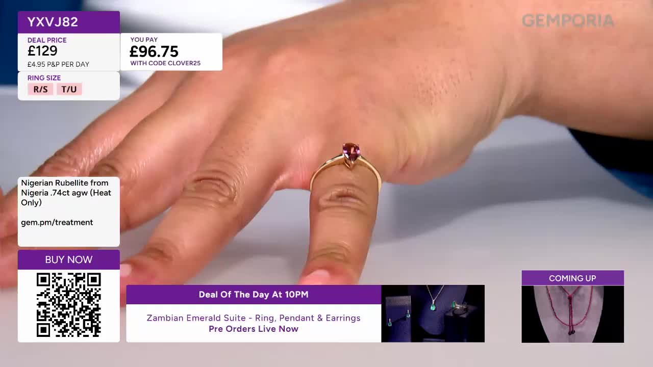 A hand displays a gold ring with a deep pink gemstone, its band catching the light. Beside it, a QR code offers a way to purchase.