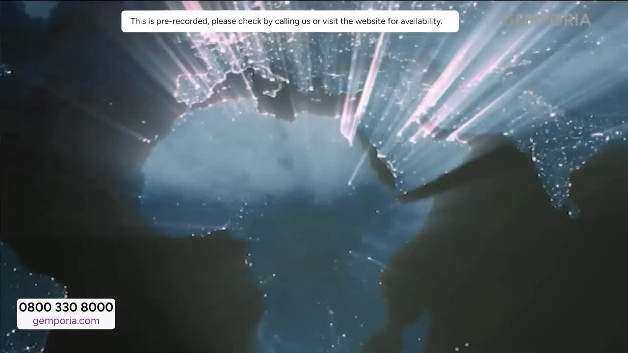 The earth glows with city lights, streaks of light radiating outwards. A banner at the bottom of the screen displays a phone number and website for Gems TV.