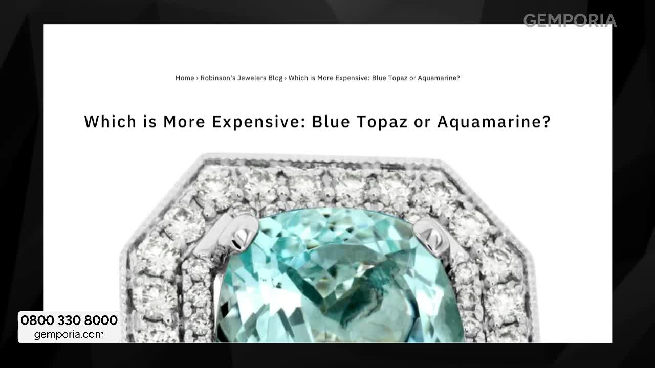 A large aquamarine gemstone, surrounded by small diamonds, sits prominently on a white background. The words "Which is More Expensive: Blue Topaz or Aquamarine?" are displayed above the jewel. A large aquamarine gemstone, surrounded by small diamonds, sits prominently on a white background. The words "Which is More Expensive: Blue Topaz or Aquamarine?" are displayed above the jewel.