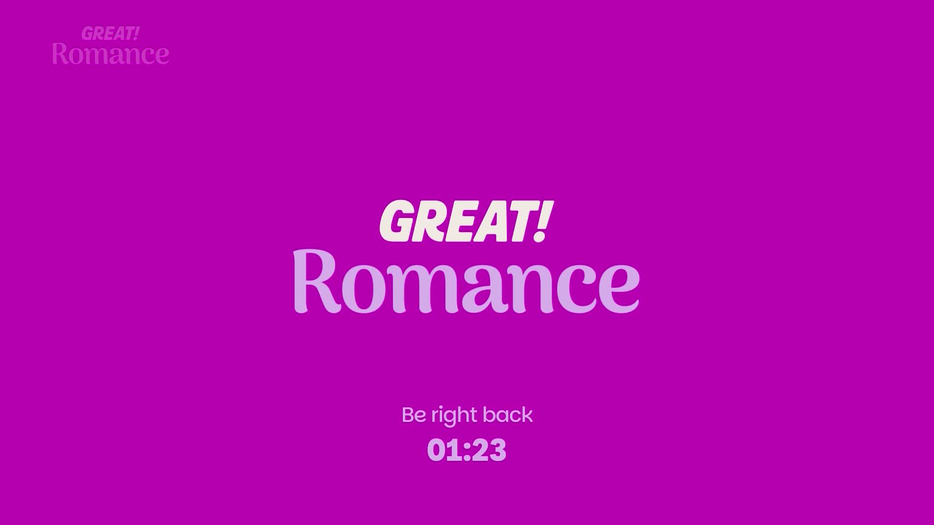 The words "GREAT! Romance" are centered on a vibrant pink background. A timer counts down from 01:23, indicating a brief pause in programming.
