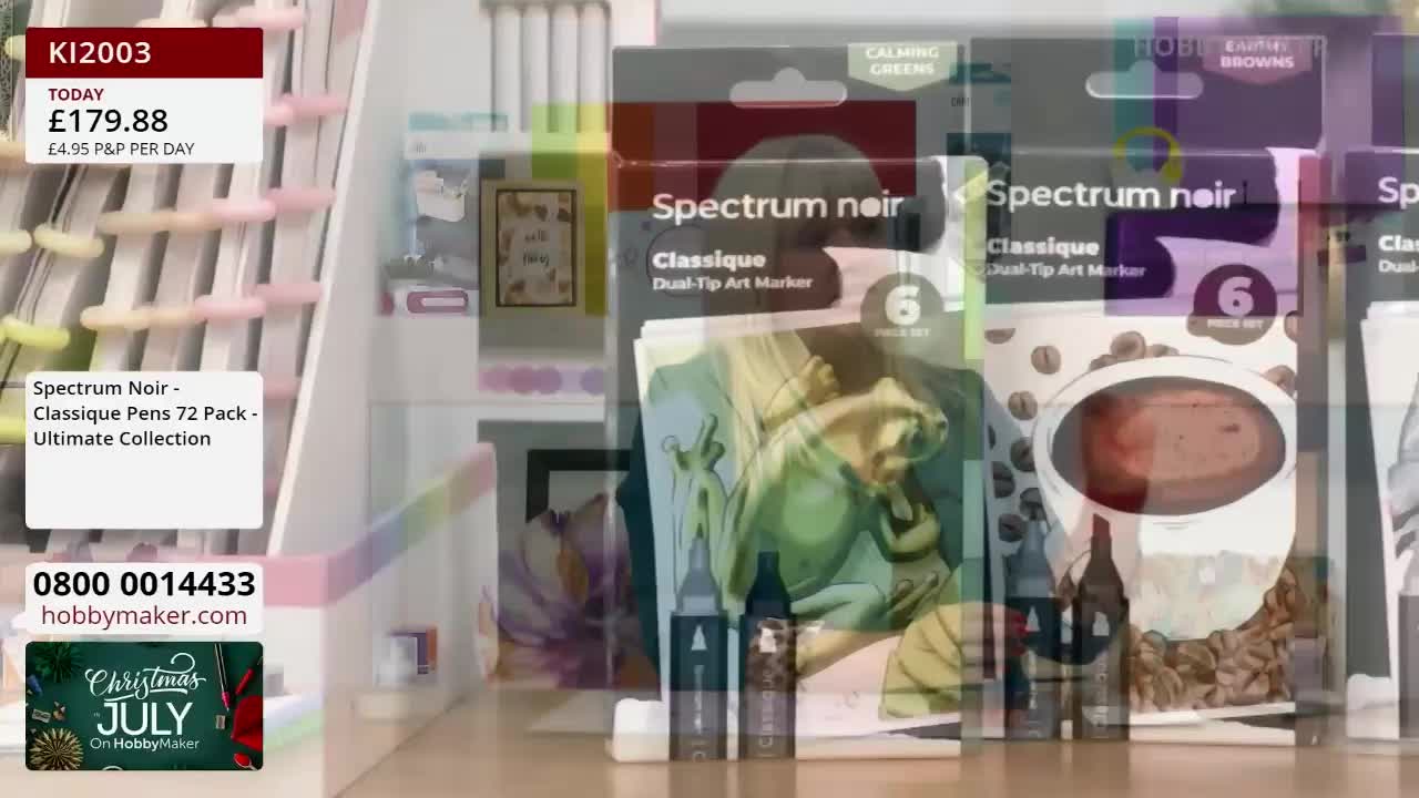 A display of art supplies, including Spectrum Noir markers, is arranged on shelves. The Hobby Maker logo and a price tag are visible, suggesting a television shopping segment.
