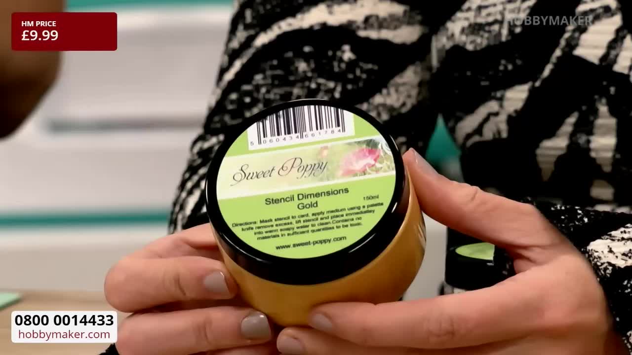 A hand is holding up a jar of "Sweet Poppy" stencil dimensions gold, the label clearly visible. The price tag of £9.99 is displayed in the top left corner, probably from Hobby Maker.
