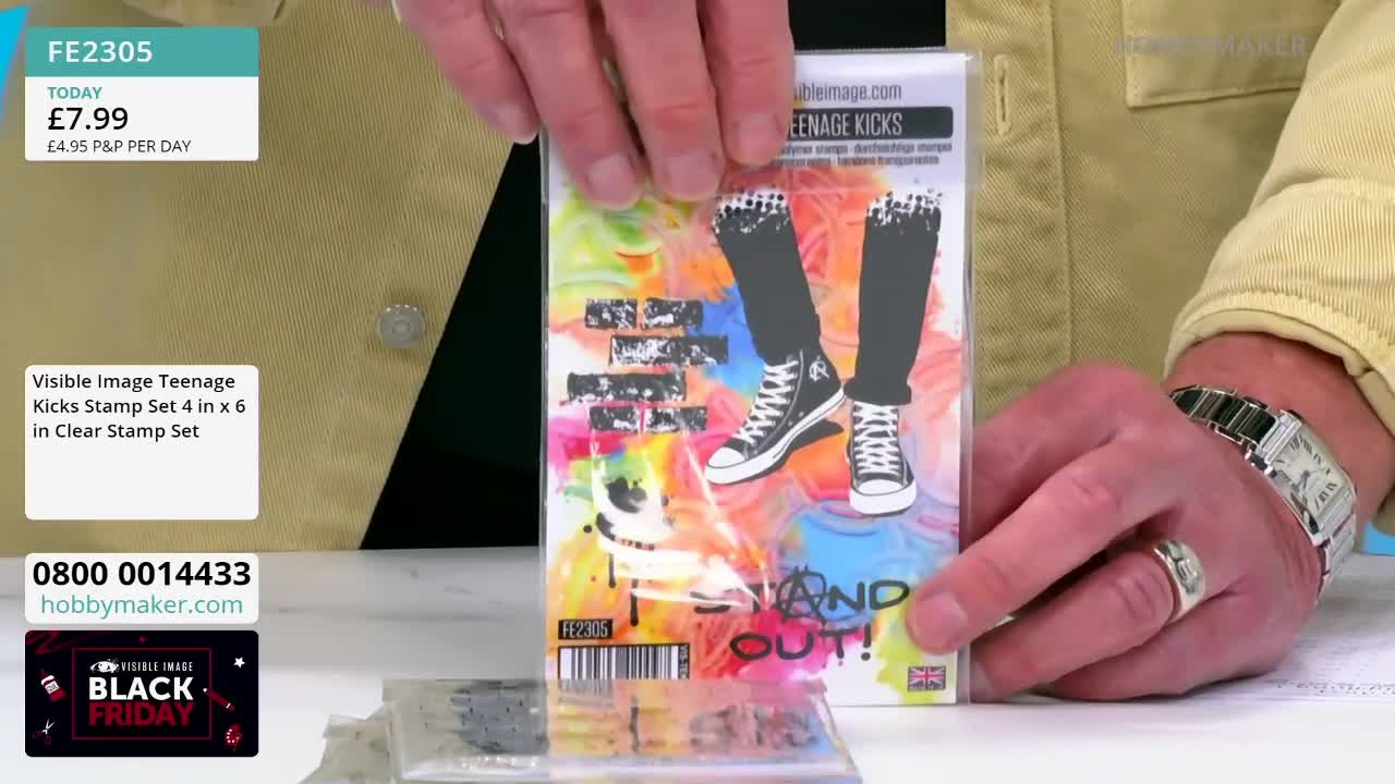 A man is holding up a stamp set featuring a design of legs and trainers, the packaging showing a Union Jack. The Hobby Maker logo is visible in the corner, and the price is listed as £7.99.
