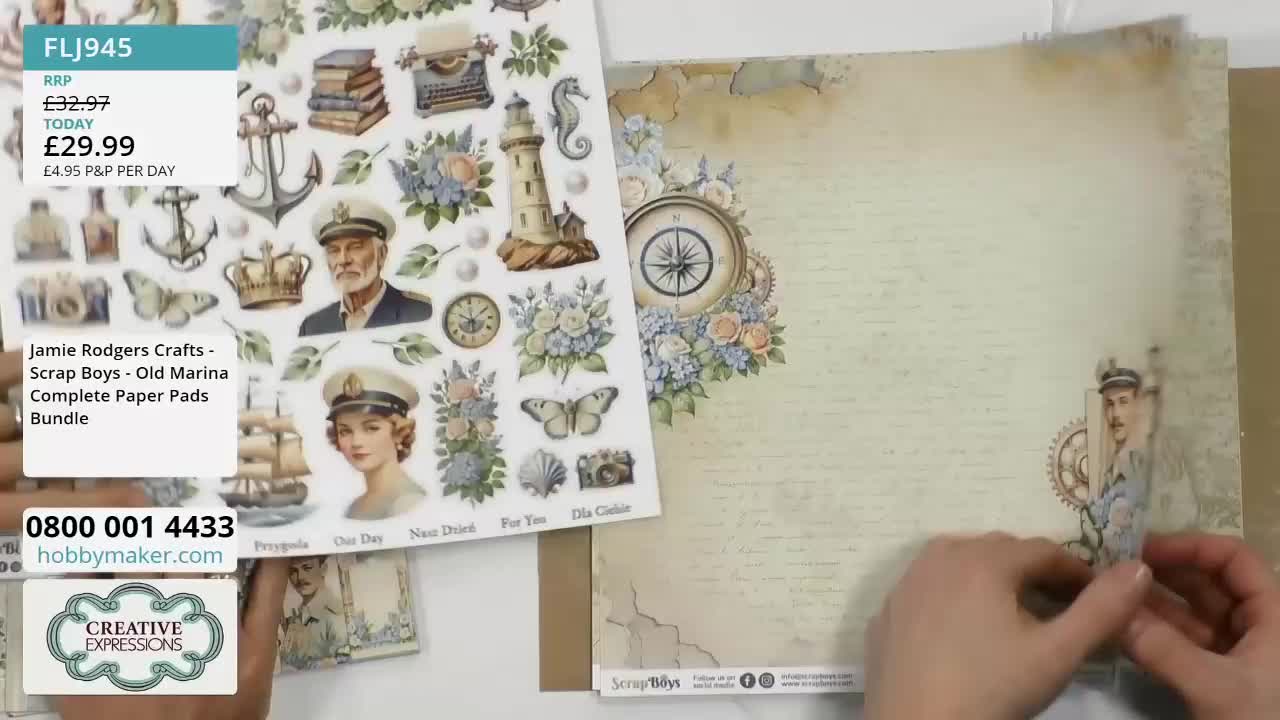 A sheet of nautical-themed stickers is held over a patterned paper.  Hands are placing a sticker of a man in uniform onto the paper.