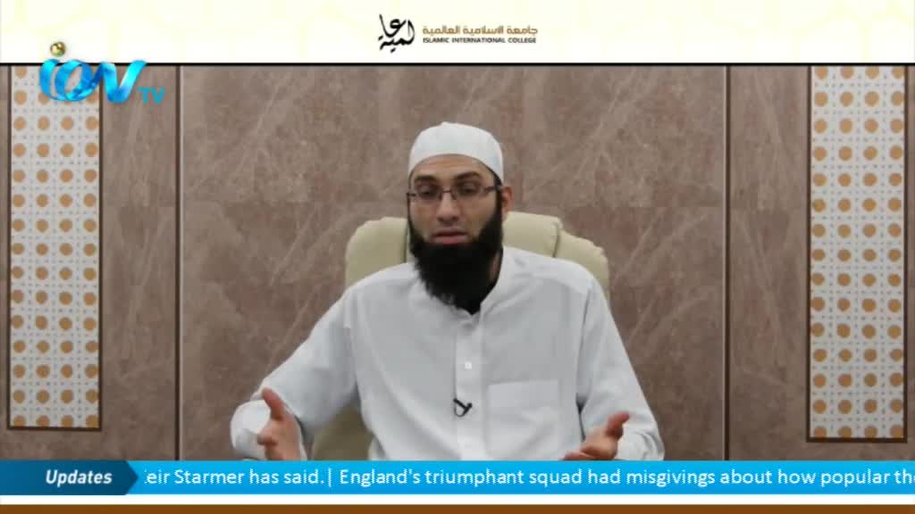 A man in a white shirt and cap sits in a chair, gesturing with his hands as he speaks. The ITV logo is visible in the corner, with news updates scrolling below.
