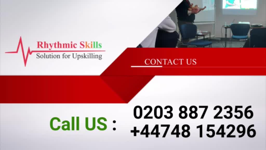 A red and white graphic with a logo and contact information overlays a room where a training session is underway. The phone numbers are displayed prominently, inviting viewers to call.
