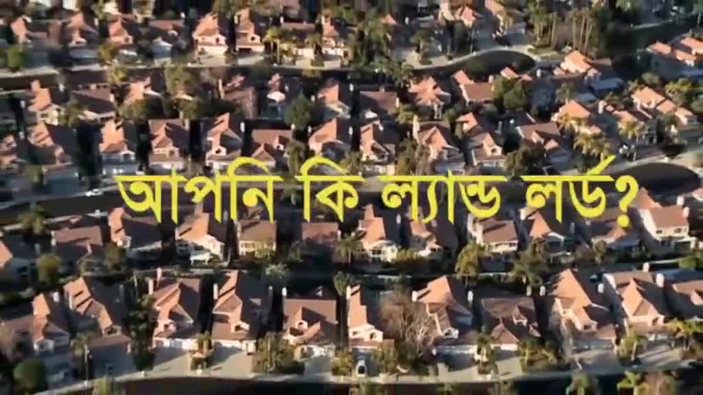 A dense grid of houses spreads across the frame, each with a brown roof. Bold yellow text is superimposed over the scene, likely a question in a foreign language.
