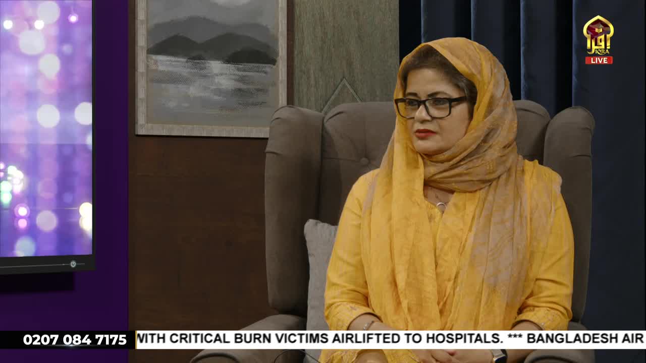 A woman in a yellow headscarf and glasses sits in a plush armchair, looking towards the camera. The Iqra TV logo is visible, and a news ticker at the bottom reports on burn victims being airlifted to hospitals.
