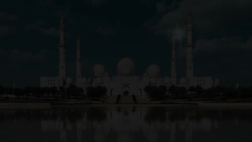 A large, white mosque stands in the distance, reflected in the still water. The sky is dark, and the building's silhouette is stark against it.
