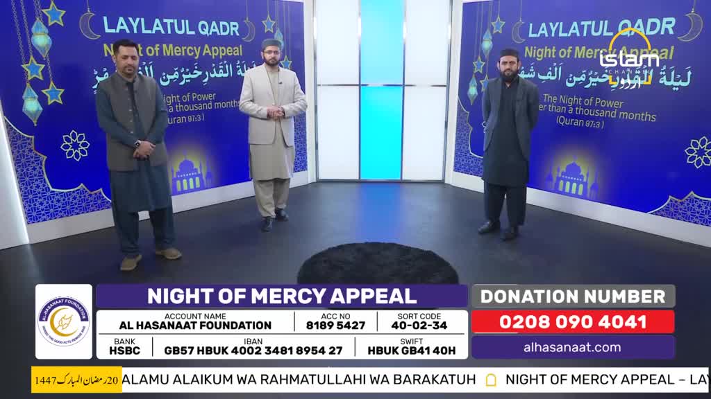 Two men stand on a studio set, bathed in blue light, with a backdrop displaying "Laylatul Qadr" and Arabic script. A donation number and bank details are prominently displayed at the bottom of the screen. Two men stand on a studio set, bathed in blue light, with a backdrop displaying "Laylatul Qadr" and Arabic script. A donation number and bank details are prominently displayed at the bottom of the screen.