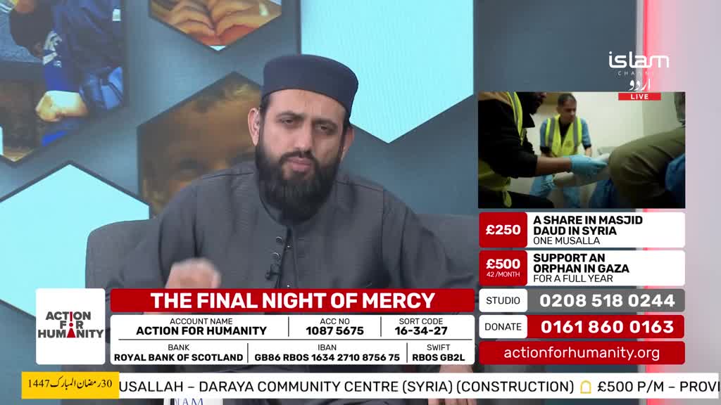 A man with a beard and a black cap speaks from a studio, while a smaller screen shows two people in high-visibility vests attending to someone. Below them, donation options flash on screen, including support for a mosque in Syria and an orphan in Gaza. A man with a beard and a black cap speaks from a studio, while a smaller screen shows two people in high-visibility vests attending to someone. Below them, donation options flash on screen, including support for a mosque in Syria and an orphan in Gaza.