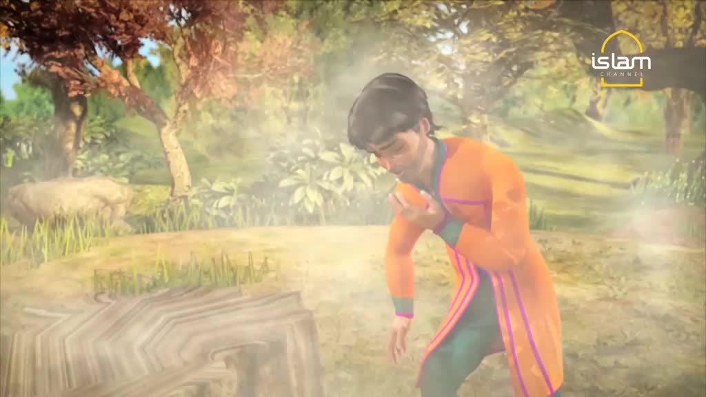 A man in an orange tunic stands in a misty clearing, clutching his chest.  The scene, likely from a program on the Islam Channel, shows a rendered outdoor setting with trees and a stump.
