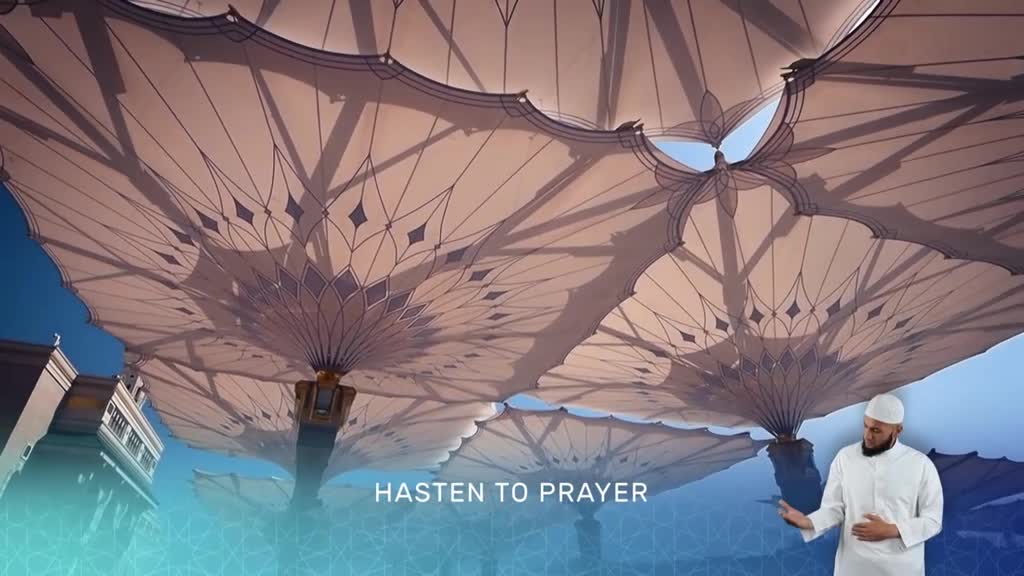 Massive, ornate umbrellas cast geometric shadows across the courtyard. A man in a white robe gestures, the words "Hasten to Prayer" appearing below him.
