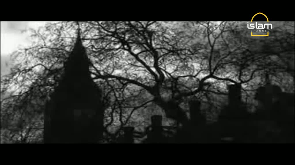 The spire of a building, likely in the United Kingdom, is silhouetted against a cloudy sky. Bare tree branches reach across the top of the frame, and the Islam Channel logo is visible in the corner.
The spire of a building, likely in the United Kingdom, is silhouetted against a cloudy sky. Bare tree branches reach across the top of the frame, and the Islam Channel logo is visible in the corner.