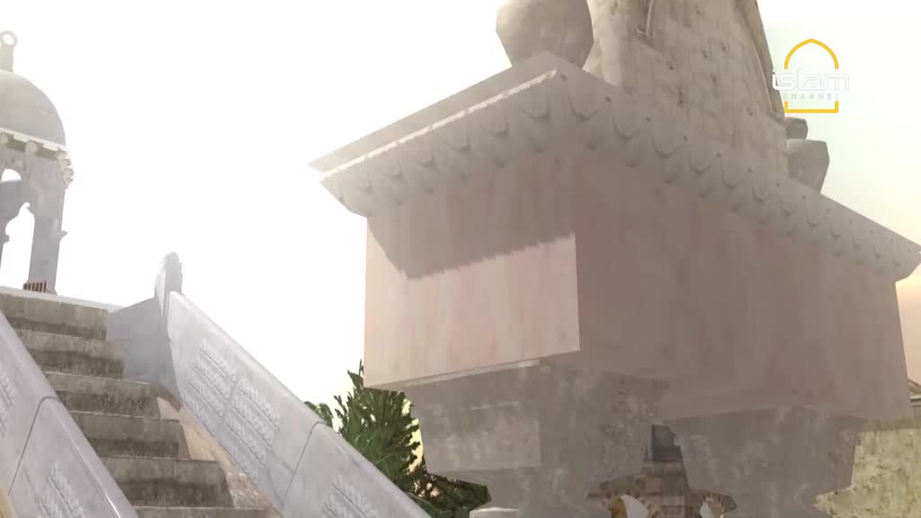 A set of stone stairs leads up towards a large, ornate structure; the Islam Channel logo is visible in the top right.  The scene is bathed in a hazy, diffused light, giving the architecture a soft, almost dreamlike quality.
