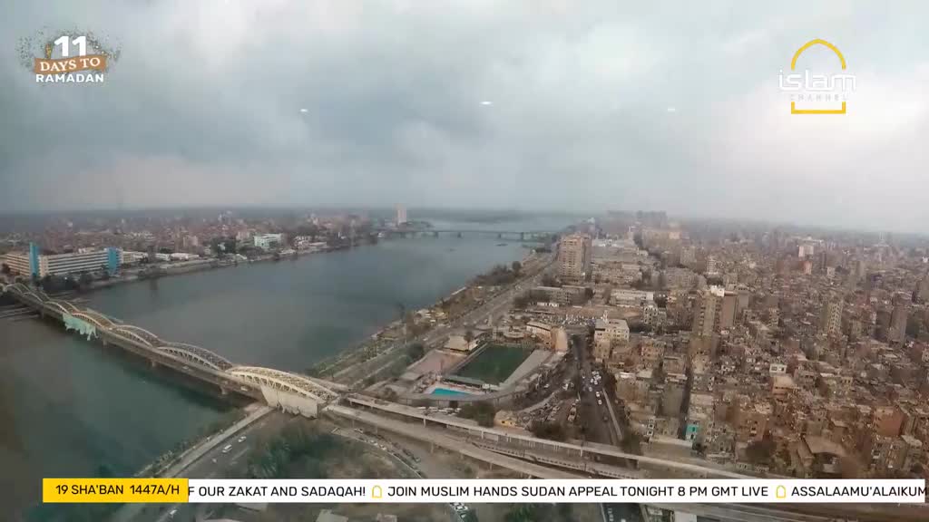Cars move across a wide bridge spanning a river that cuts through a densely built city. The sky above is overcast, with a graphic indicating "11 Days to Ramadan" and the Islam Channel logo.