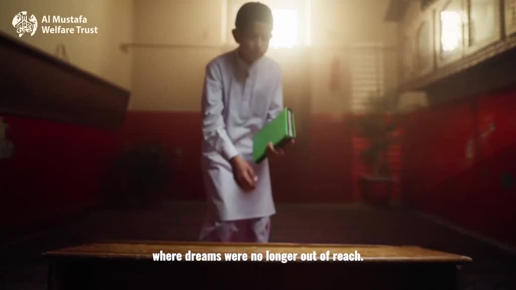 A young boy in a white tunic stands holding a green book. Sunlight streams in from a window, illuminating the dust motes in the air. A young boy in a white tunic stands holding a green book. Sunlight streams in from a window, illuminating the dust motes in the air.