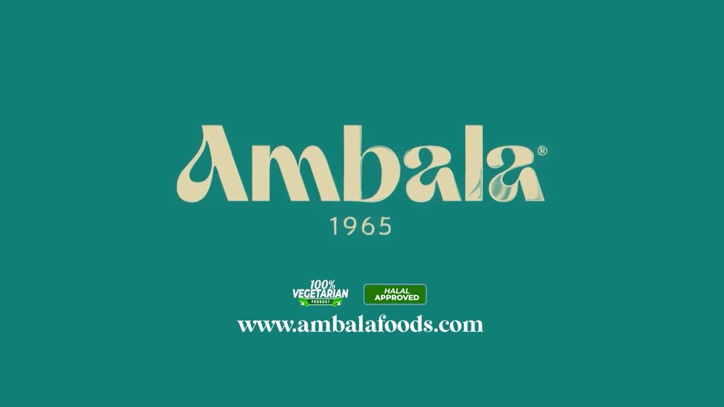 The "Ambala 1965" logo appears against a teal background. Below it, small badges indicate "100% Vegetarian" and "Halal Approved," followed by the website address "www.ambalafoods.com."