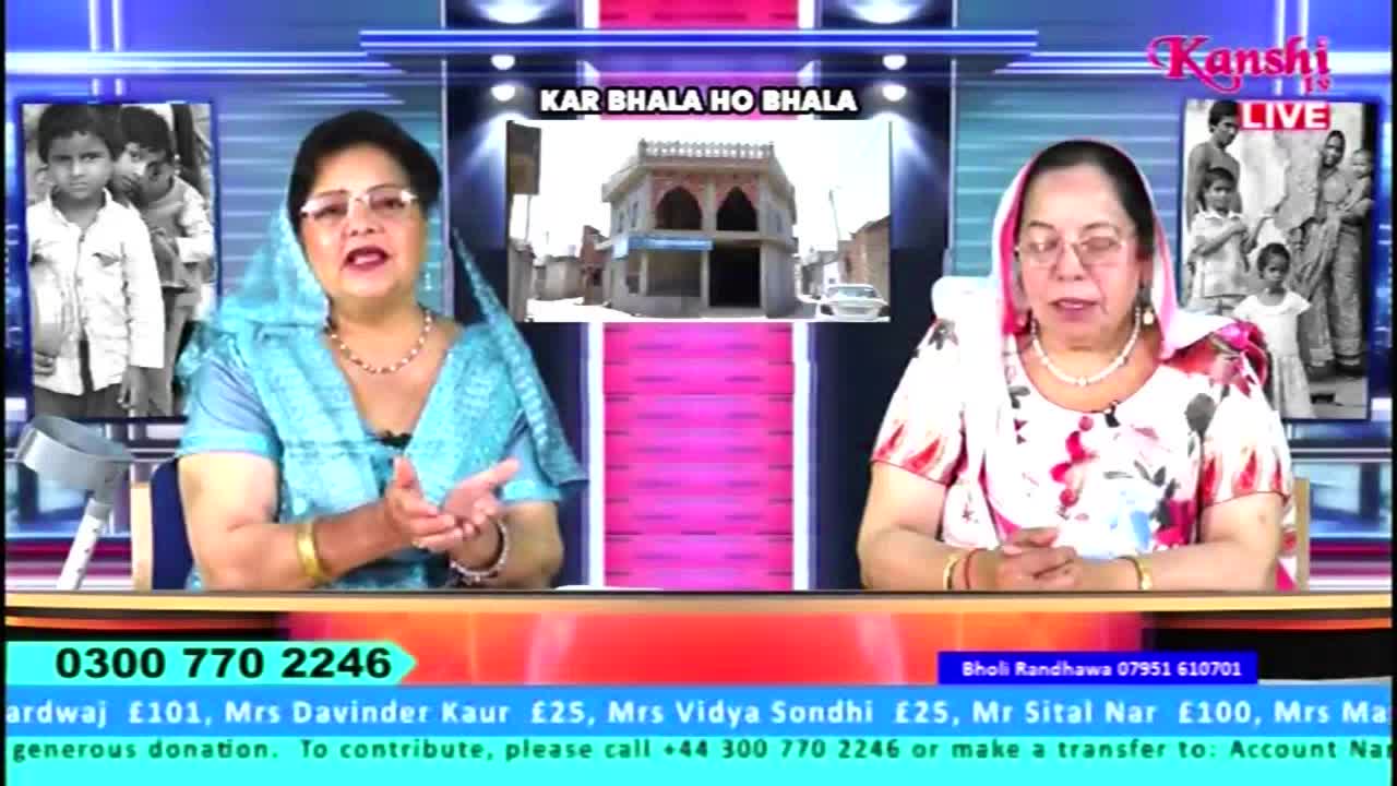 Two women in headscarves sit behind a desk, gesturing as they speak on Kanshi TV. A graphic of a building and children appears behind them, and a phone number scrolls across the bottom of the screen.
