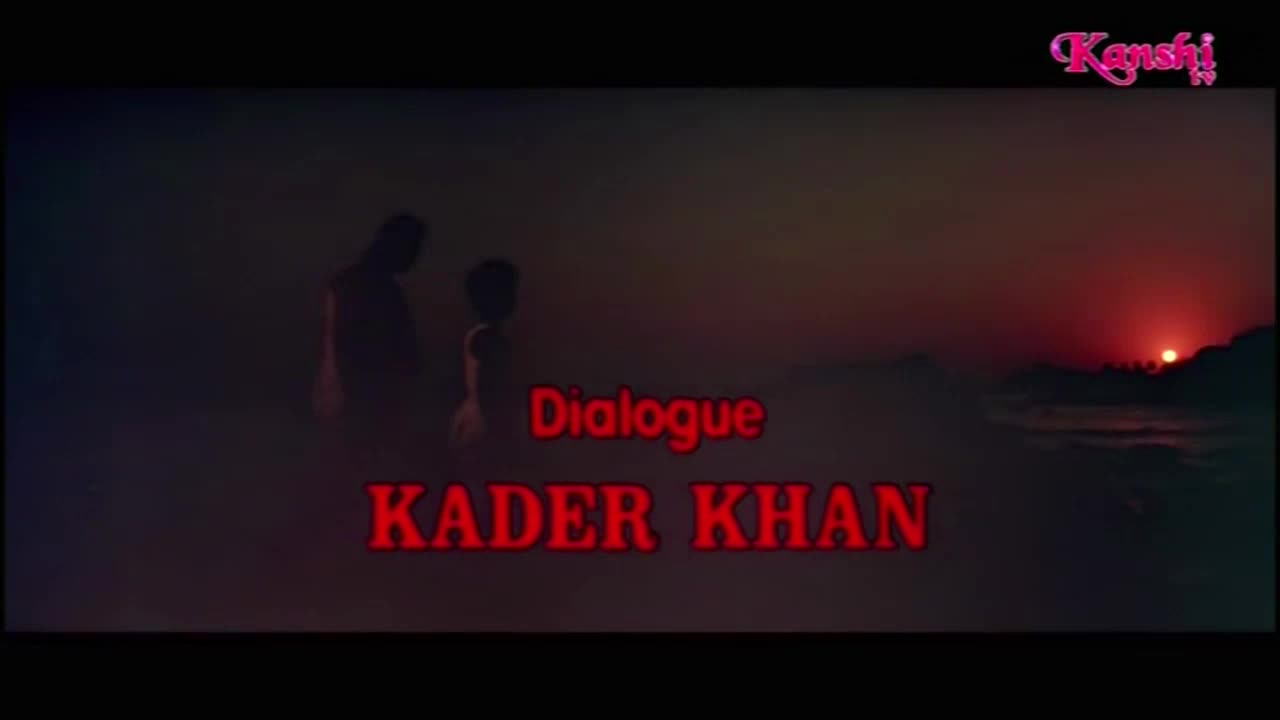 Two figures stand silhouetted against a fiery sunset, with the credits for "Kader Khan" displayed in bold red letters. The Kanshi TV logo sits in the top right corner, as the scene fades to black.
