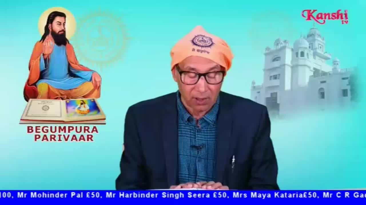 A man in a turban and glasses speaks, his hands gesturing as he reads from a document. Behind him, the Kanshi TV logo and an illustration of a religious figure are visible.
A man in a turban and glasses speaks, his hands gesturing as he reads from a document. Behind him, the Kanshi TV logo and an illustration of a religious figure are visible.