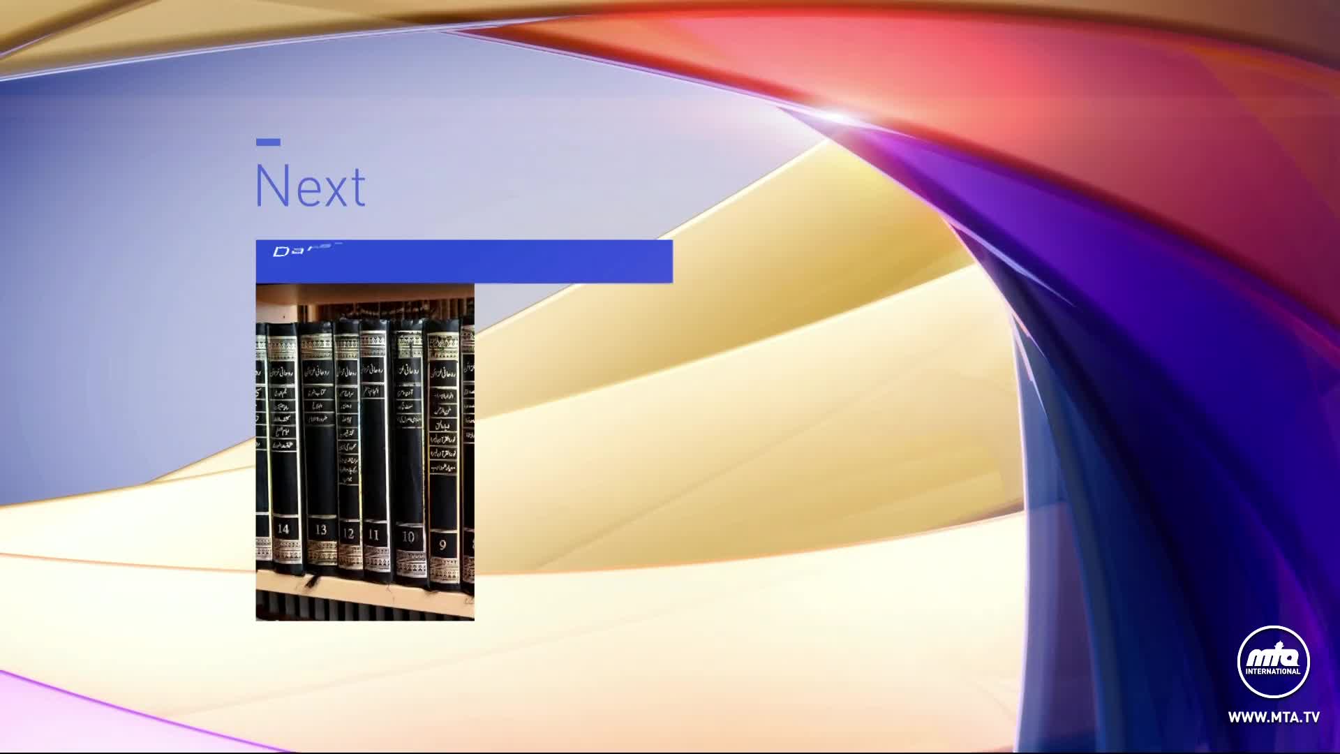 A row of black-bound books sits on a shelf, framed by a blue and gold design. The MTA1 World logo is in the lower right corner, and the word "Next" is displayed on the screen.
