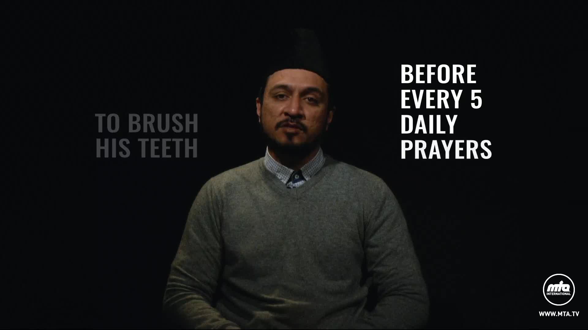 A man in a grey sweater and a skullcap looks straight at the camera against a stark black background. The MTA1 International logo appears at the bottom, and text on the screen explains the context of the message.
