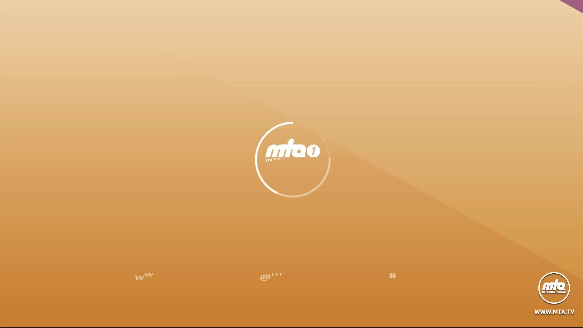 The MTA1 World logo spins in a white circle, centered against a gradient background. The website address is visible in the lower right corner.
