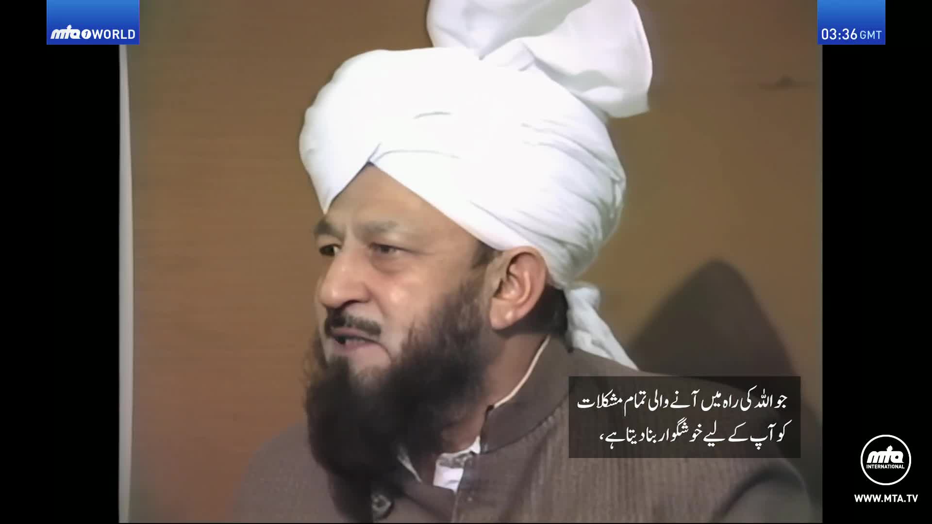 A man with a white turban and beard speaks, his expression earnest. Text overlays the bottom right of the screen, with the MTA World logo visible in the upper left.