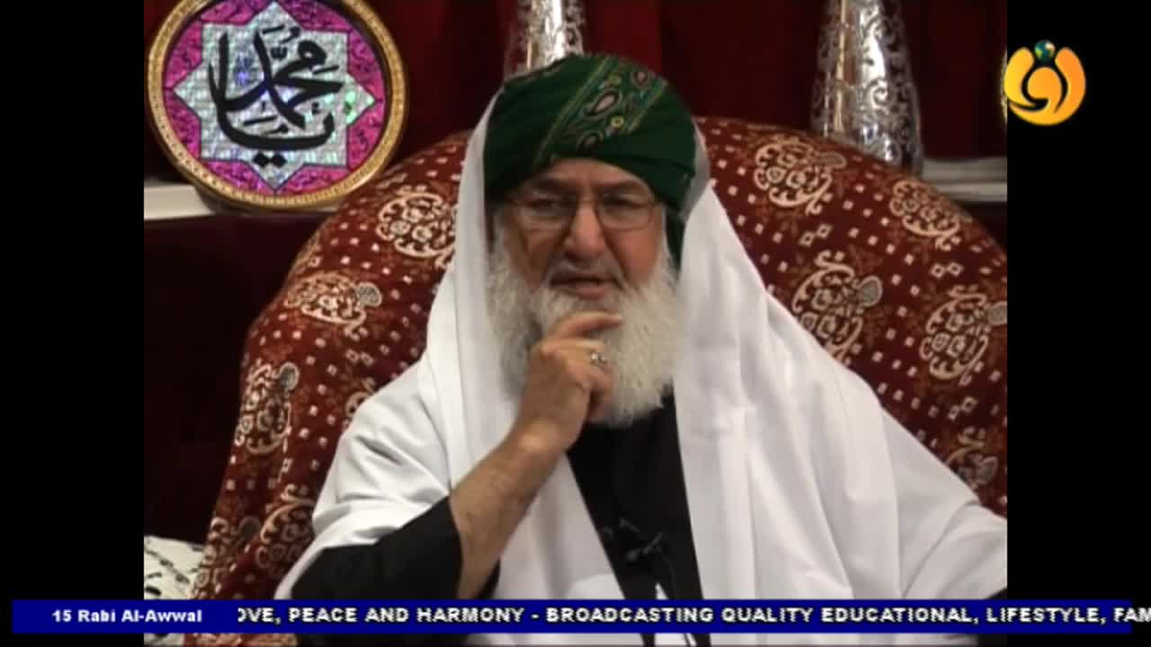 A man in a green turban and white shawl sits, his hand raised to his chin. The Noor TV logo is visible, and a banner at the bottom reads "LOVE, PEACE AND HARMONY."
