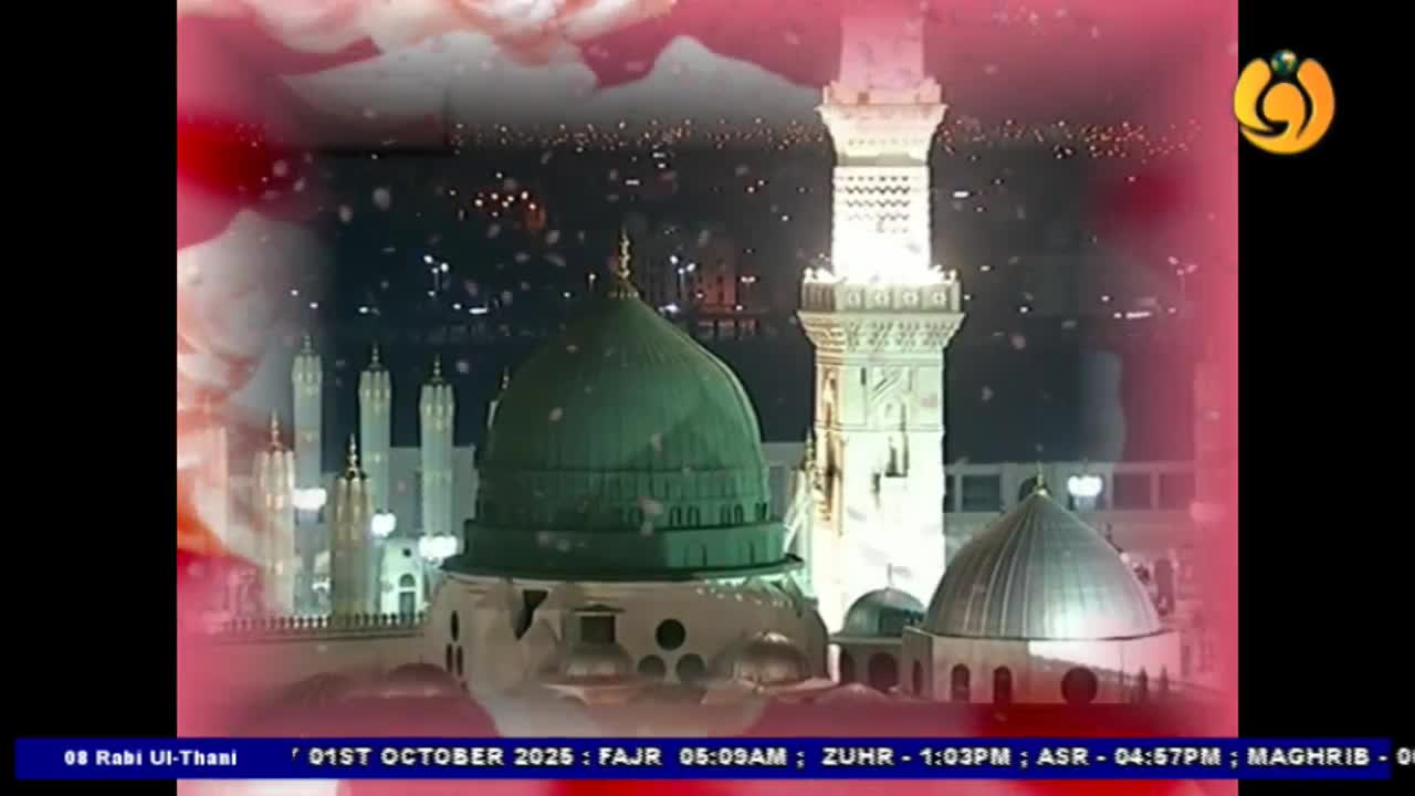 A nighttime scene of a mosque is displayed, with a green dome and minarets illuminated against a dark sky. The Noor TV logo is visible in the top right corner, and the date and prayer times are listed at the bottom.
