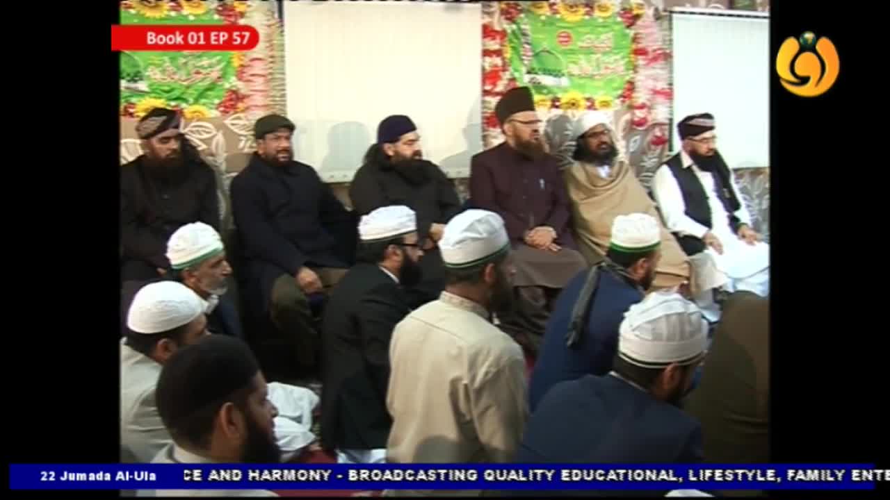 A group of men, many wearing white caps, are seated in a room, some looking towards the camera. The Noor TV logo is in the corner, and the bottom banner indicates the broadcast is about peace and harmony.
A group of men, many wearing white caps, are seated in a room, some looking towards the camera. The Noor TV logo is in the corner, and the bottom banner indicates the broadcast is about peace and harmony.